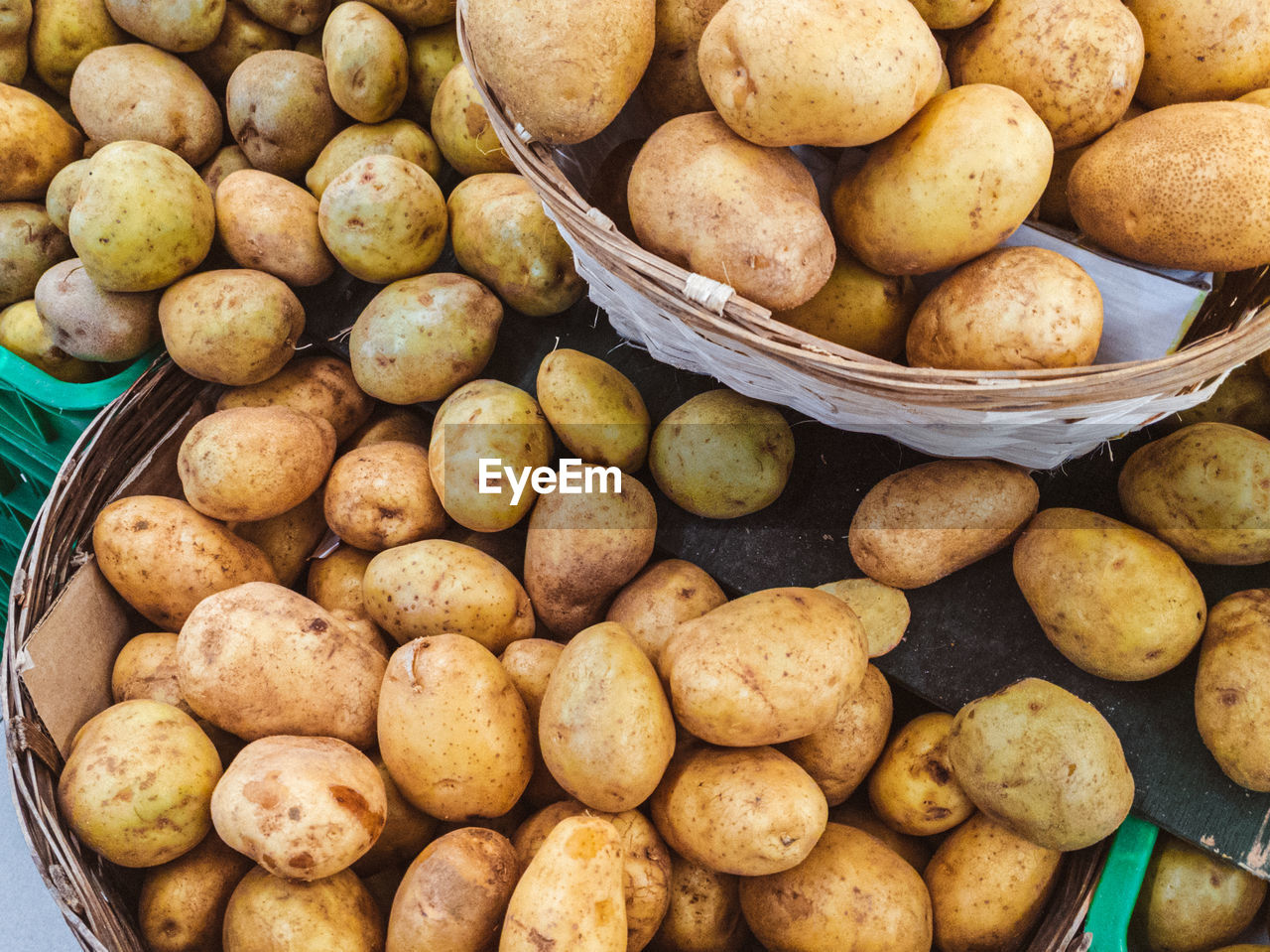 High angle view of potatoes for sale at market stall