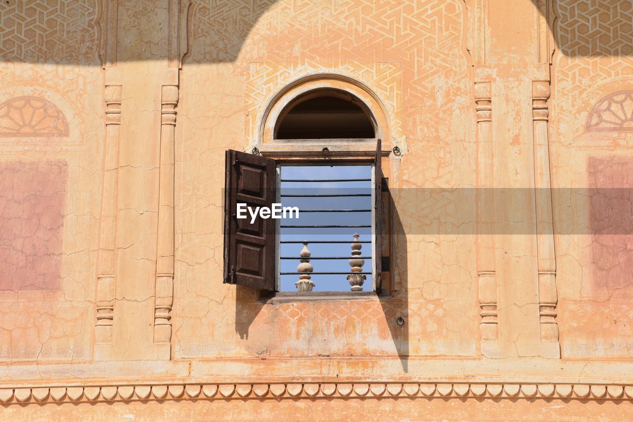 architecture, built structure, building exterior, arch, wall, brick, no people, history, building, the past, facade, day, wood, travel destinations, religion, wall - building feature, sunlight, outdoors, entrance, window, door, travel, tourism, belief, nature, ancient, place of worship, iron, ancient history