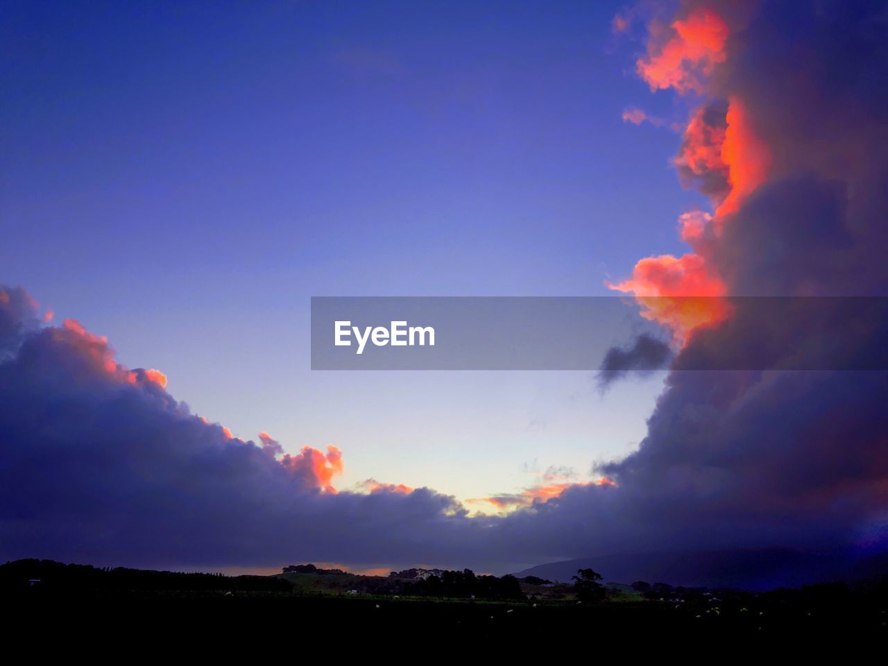 SILHOUETTE LANDSCAPE AGAINST SKY DURING SUNSET