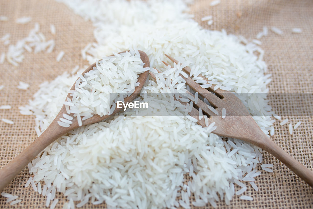 food and drink, food, indoors, wellbeing, white rice, no people, freshness, healthy eating, rice - food staple, powder, textile, still life, kitchen utensil, close-up, ingredient, high angle view, rice, wood