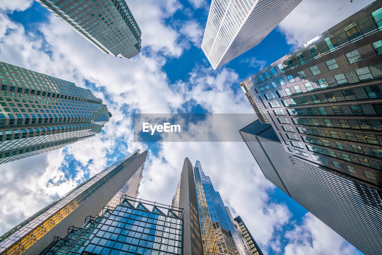 Low angle view of modern buildings against sky