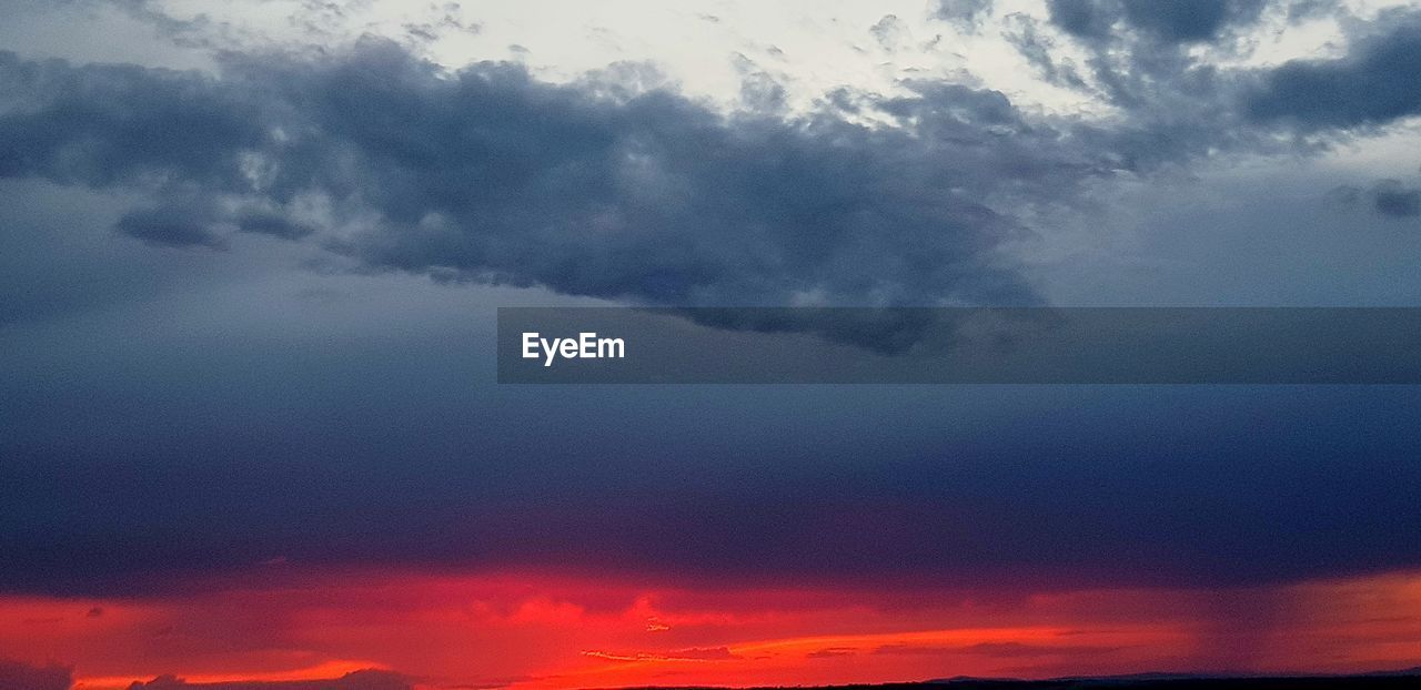 LOW ANGLE VIEW OF CLOUDS IN SKY DURING SUNSET