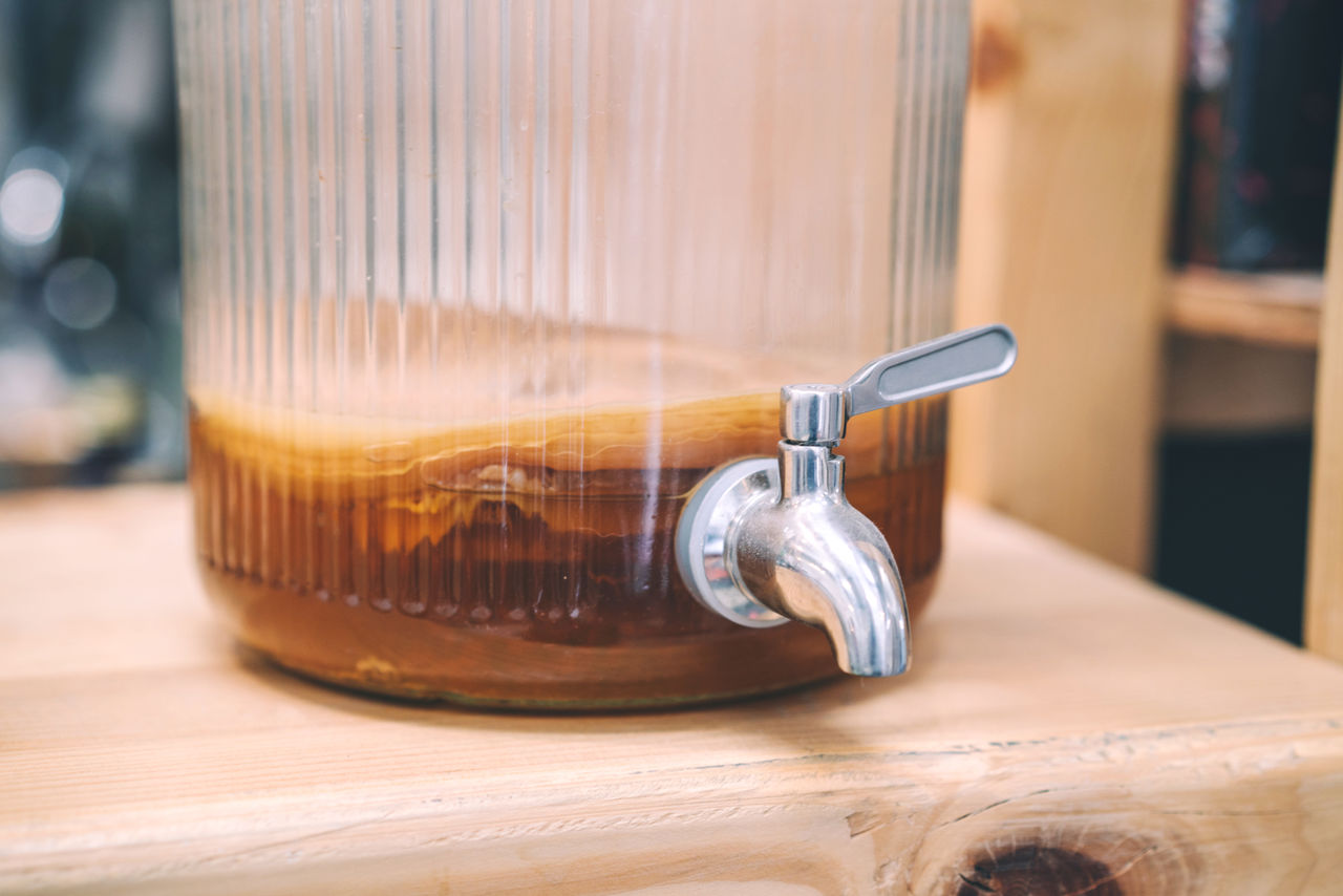 Kombucha scoby in the brewing glass jar