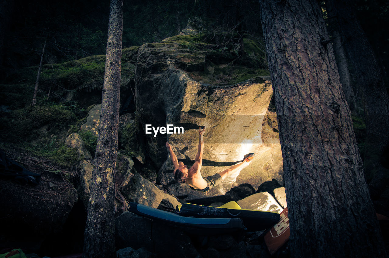 Man climbing cliff