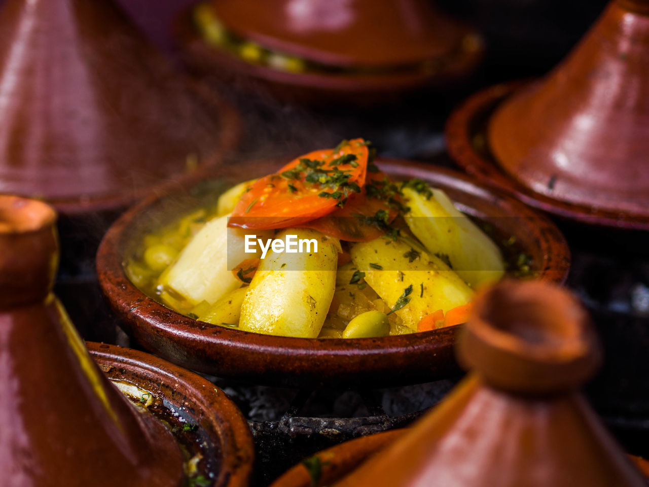 CLOSE-UP OF FRUITS IN PLATE ON TABLE