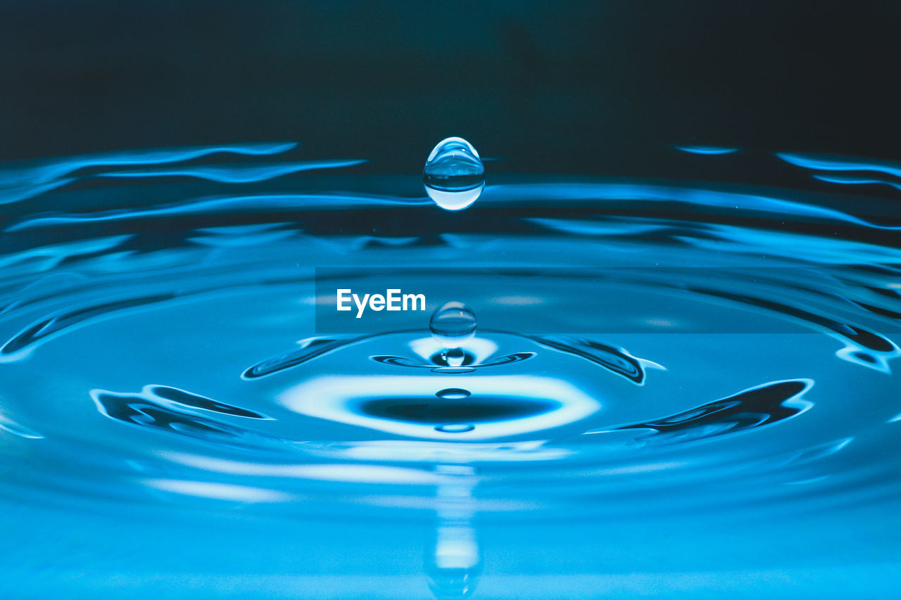 CLOSE-UP OF BLUE RIPPLED WATER