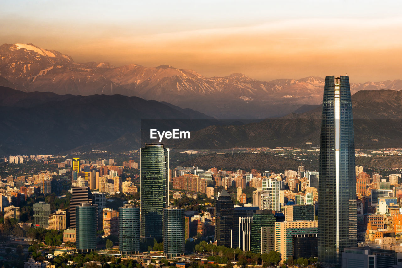 High angle view of city at sunset