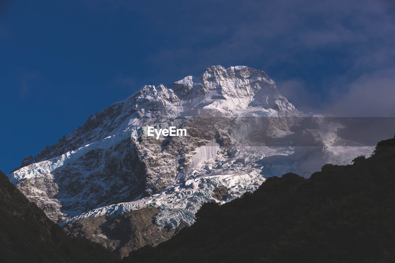 Low angle view of mt cook against sky