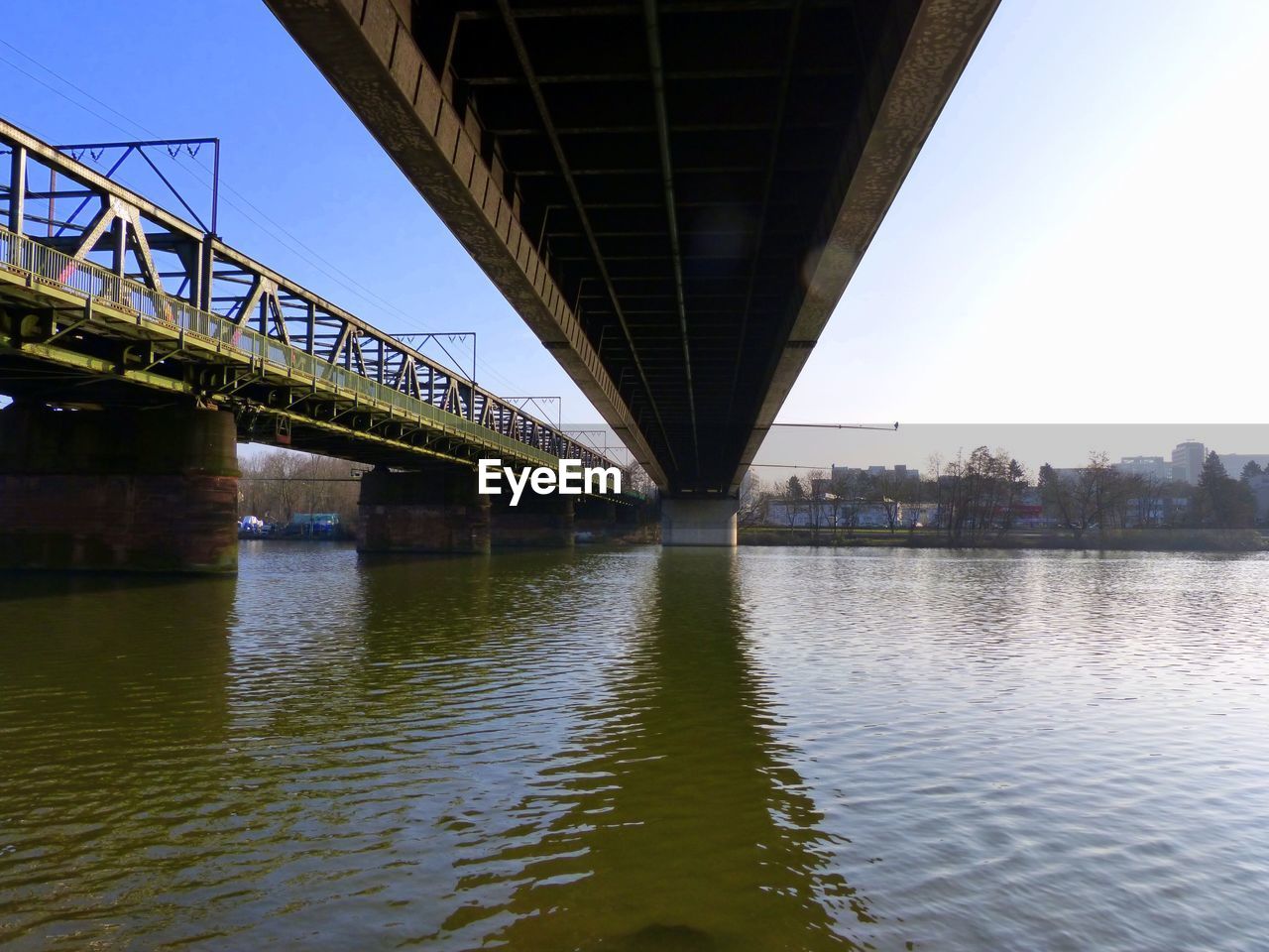 Reflection of bridge on river