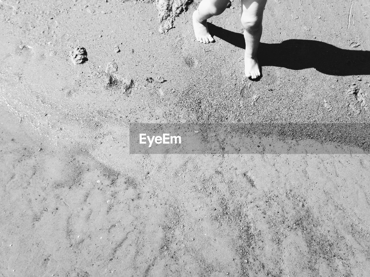 Low section of child at beach