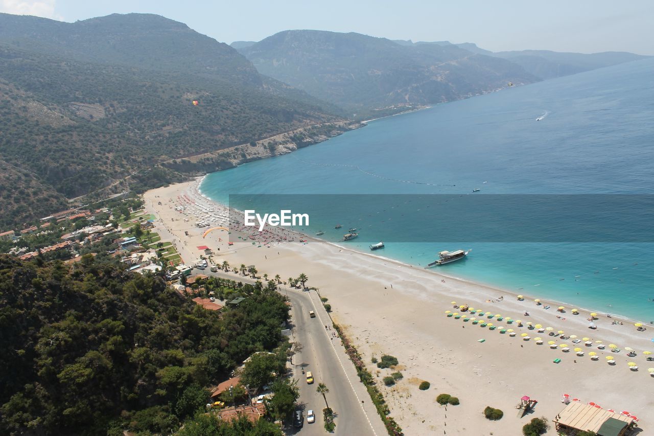 High angle view of beach against mountains