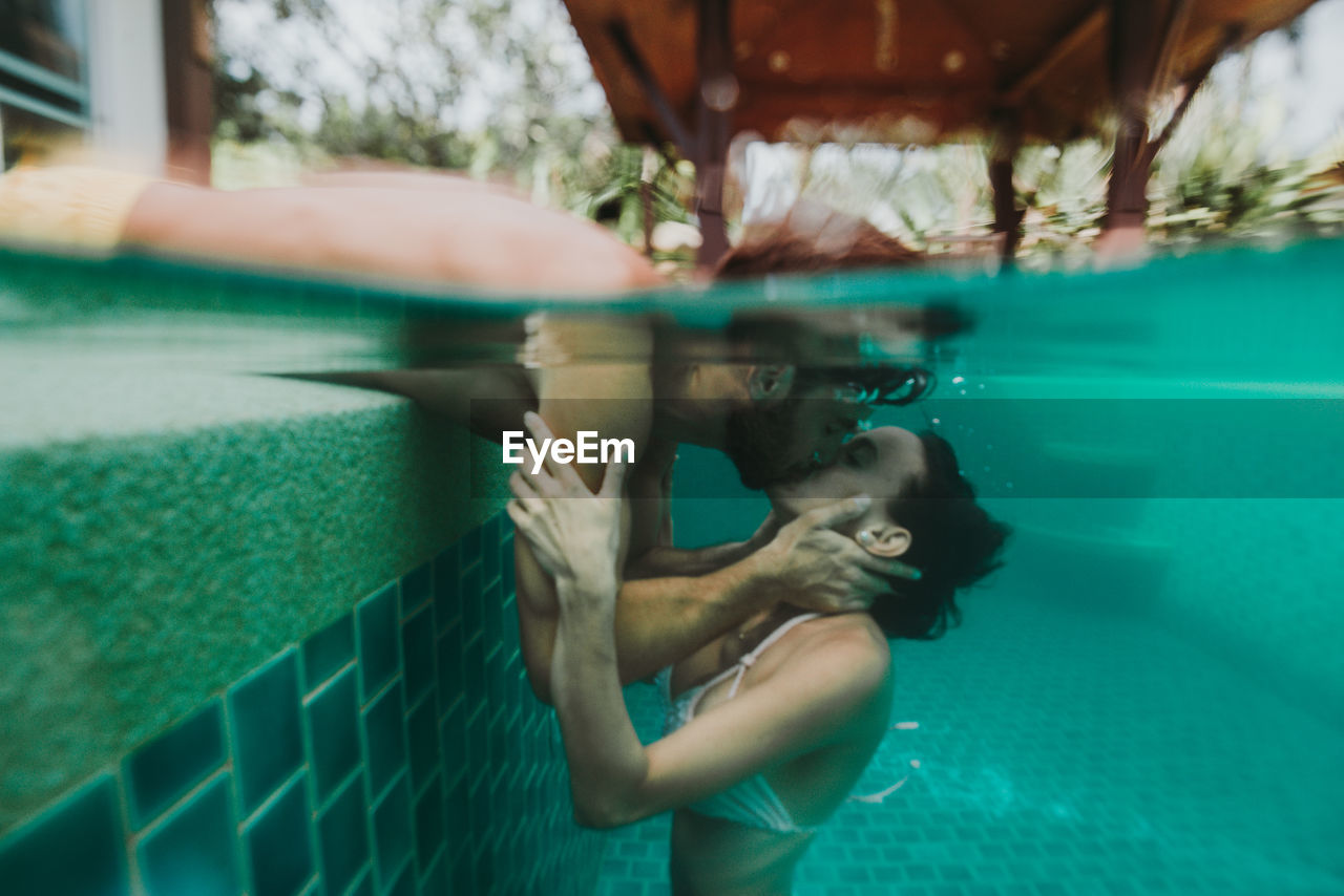 Woman swimming in pool