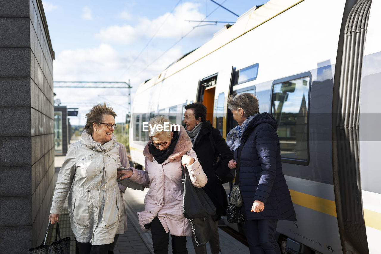 Passengers at train platform