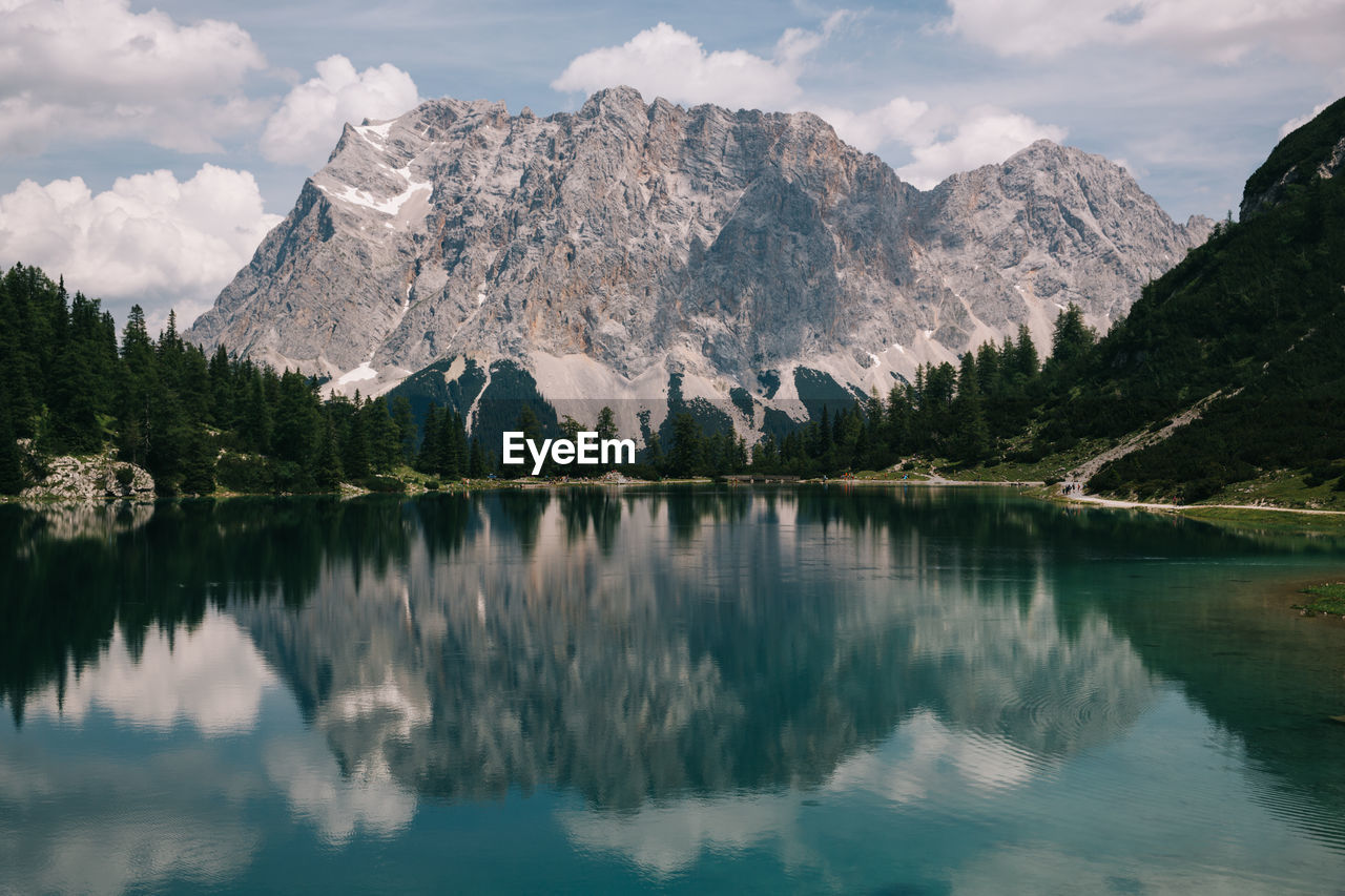 Panoramic view of lake and mountains against sky
