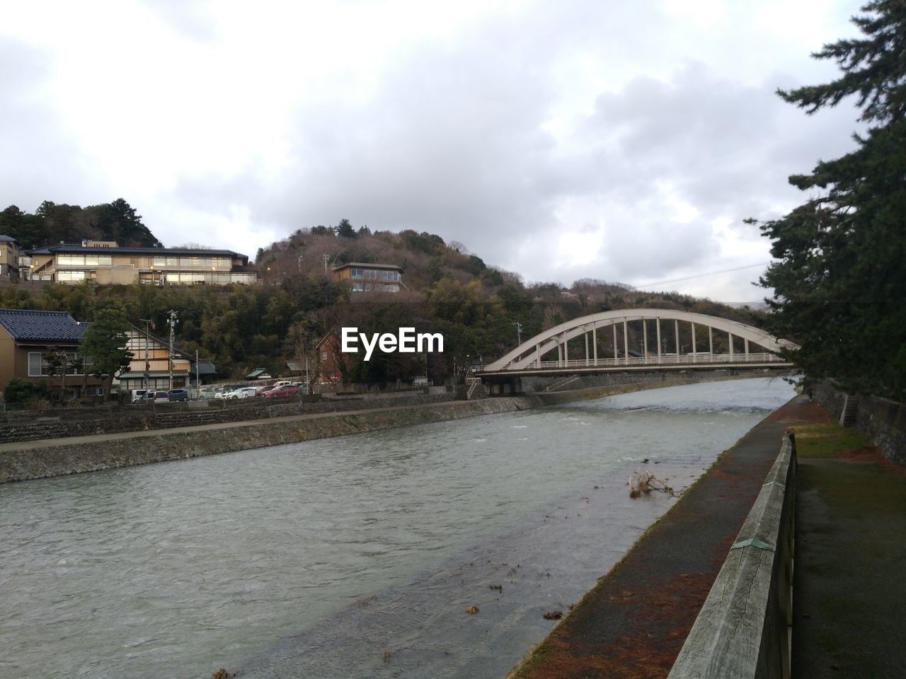 BRIDGE OVER RIVER IN CITY