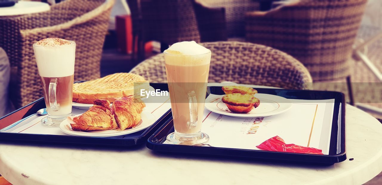 HIGH ANGLE VIEW OF BREAKFAST SERVED WITH COFFEE