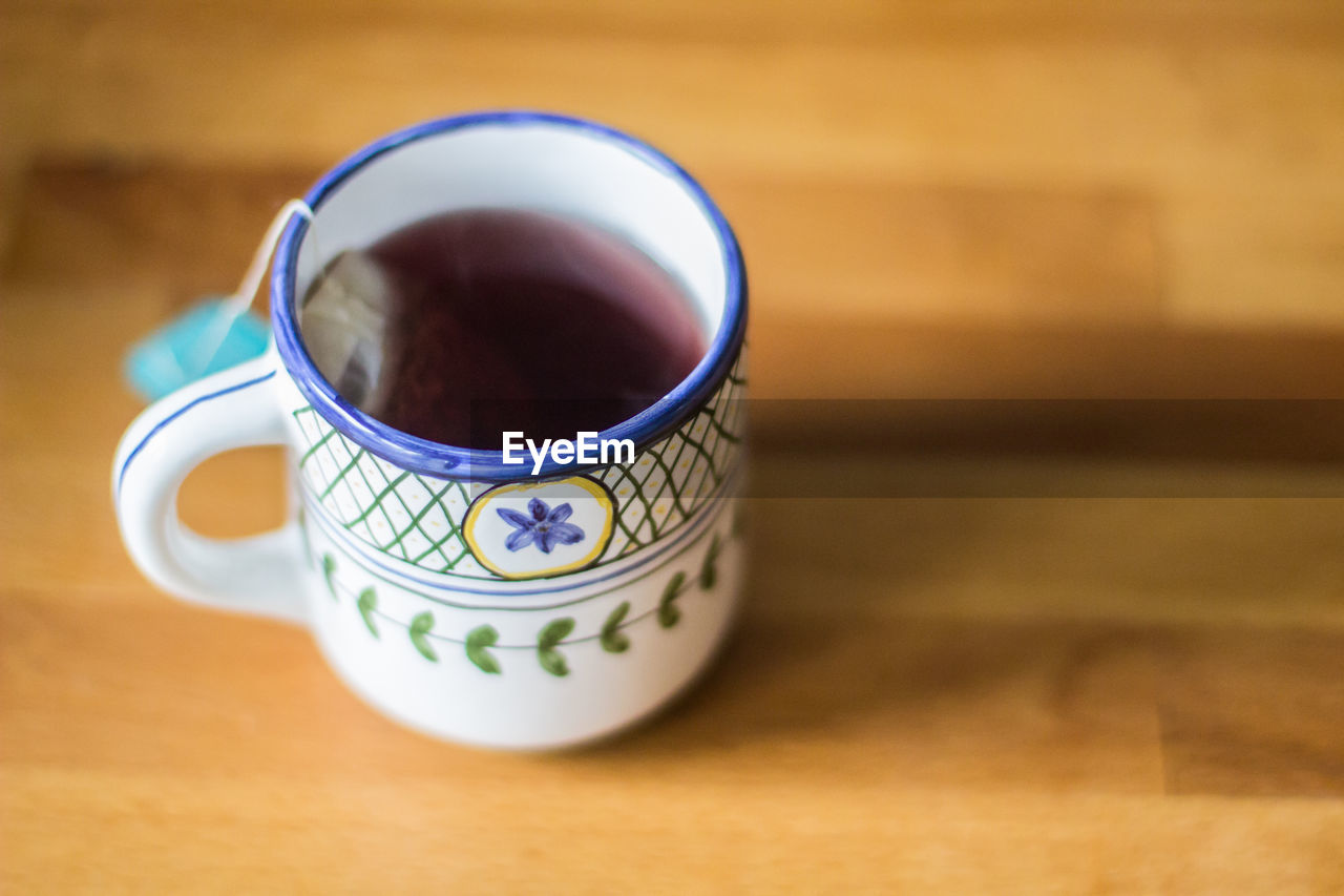 Close-up of tea on wooden table