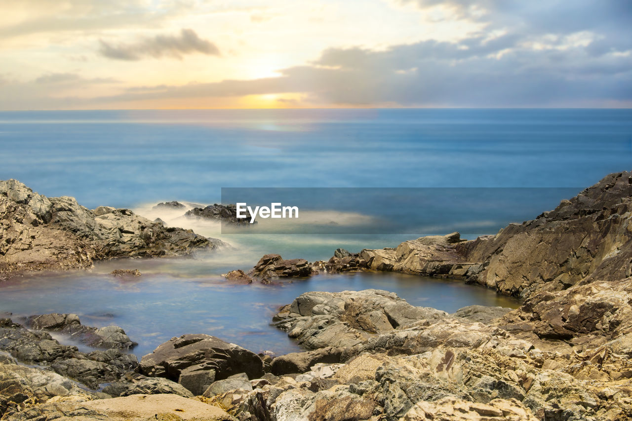 Scenic view of sea against sky during sunrisr