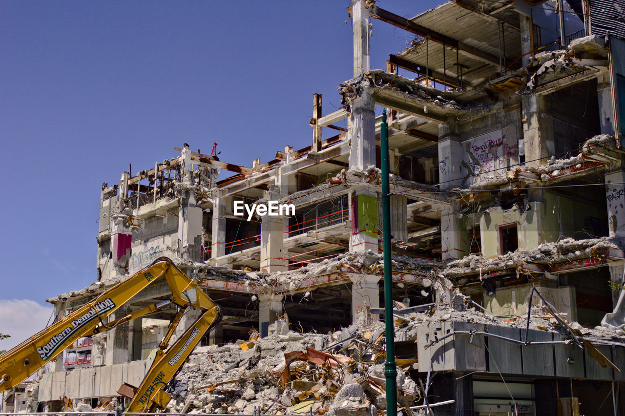 LOW ANGLE VIEW OF DAMAGED BUILDING