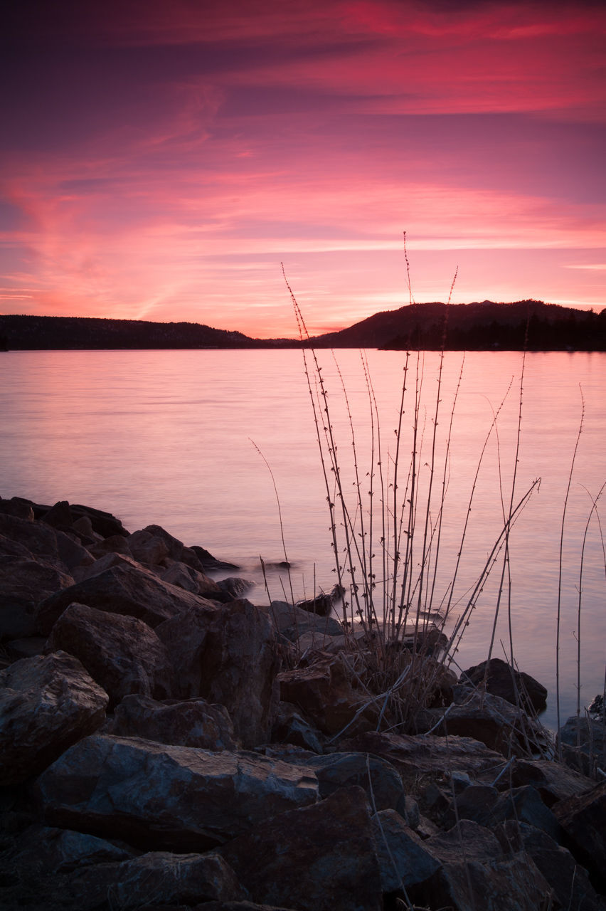 SCENIC VIEW OF SUNSET OVER SEA