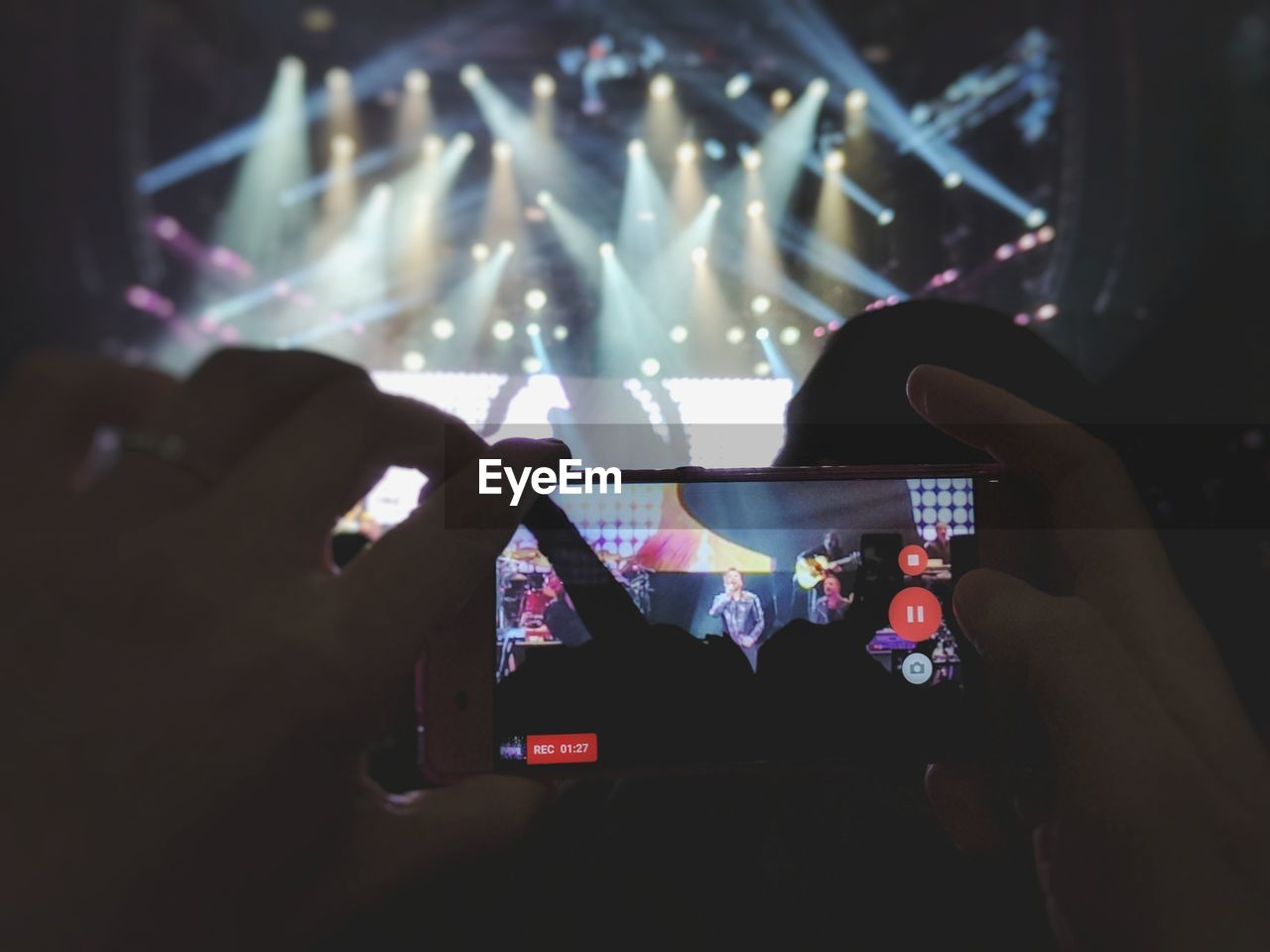 PEOPLE ENJOYING MUSIC CONCERT