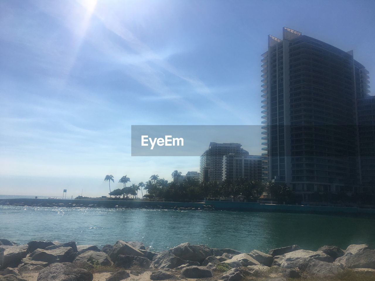 SCENIC VIEW OF SKYSCRAPERS AGAINST SKY