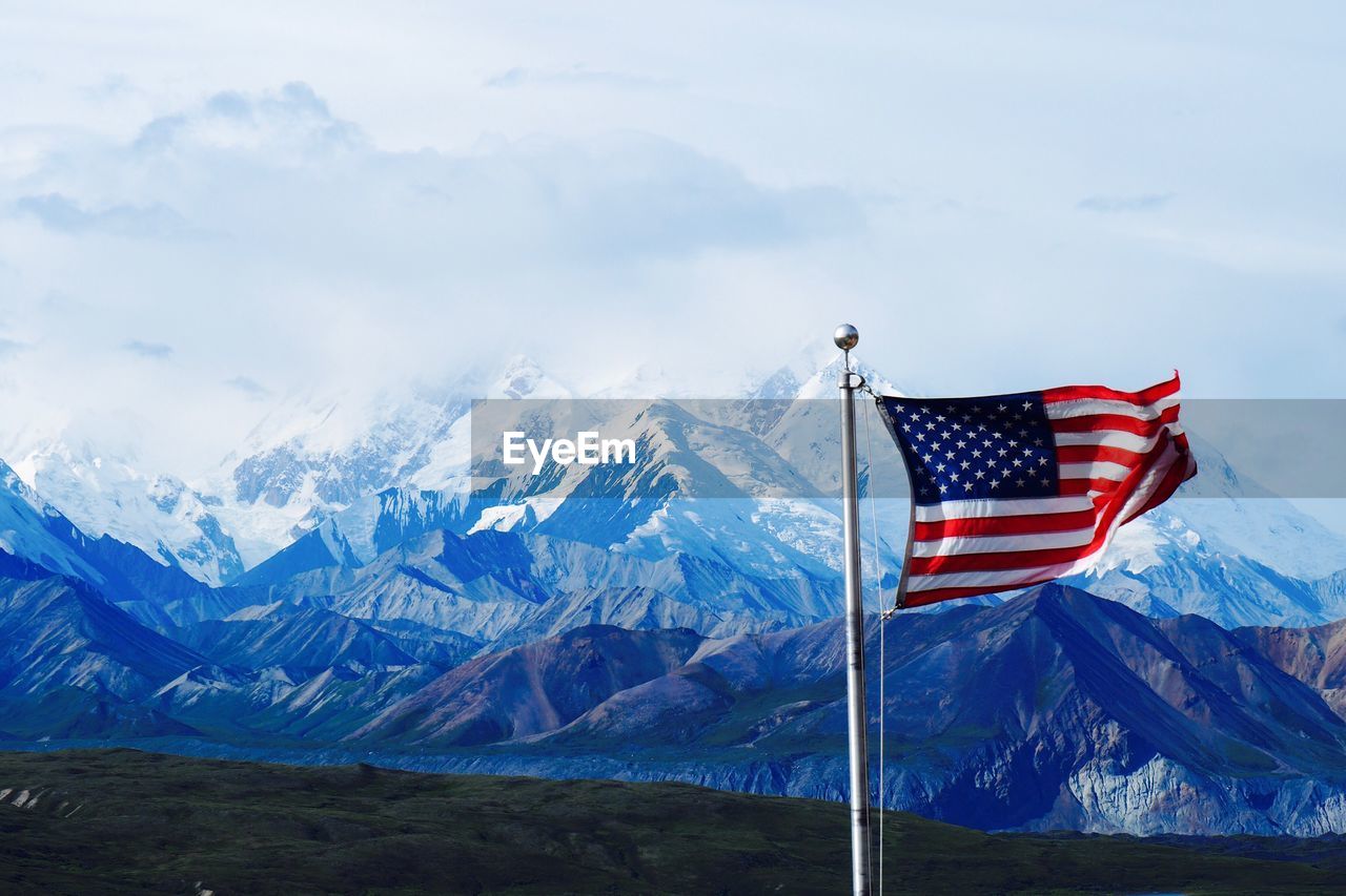 Scenic view of mountain range against sky