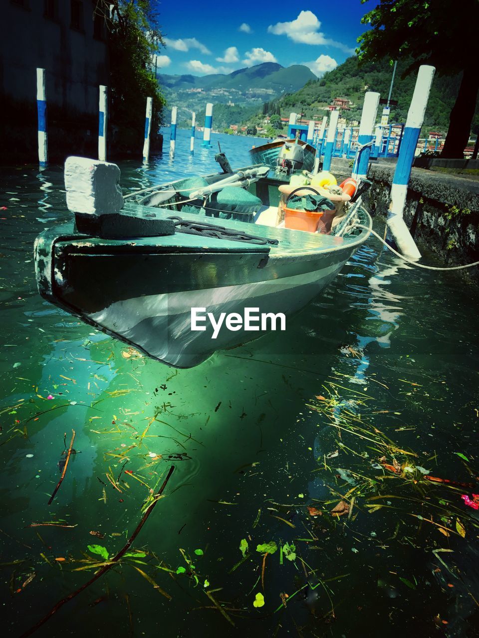 BOATS MOORED IN WATER