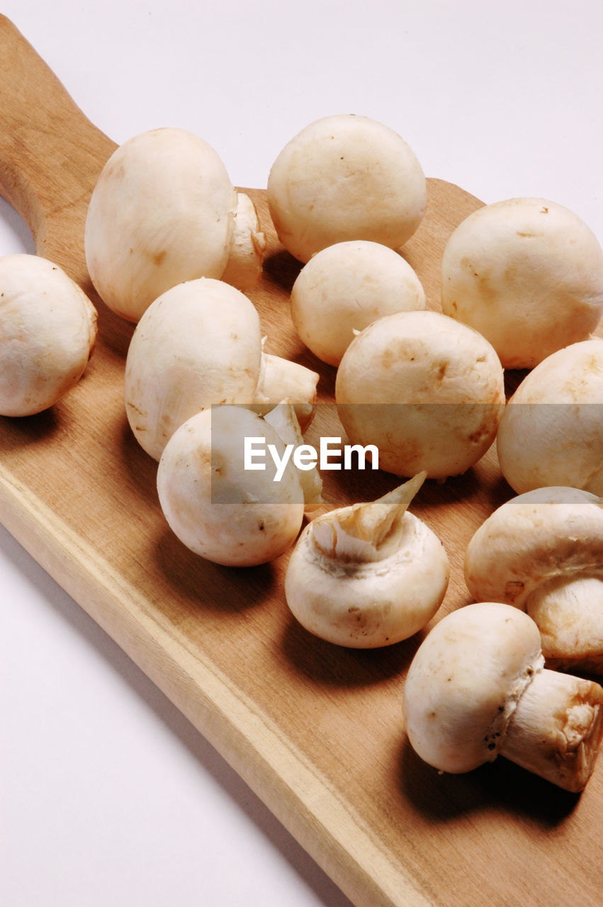 High angle view of mushroom on cutting board