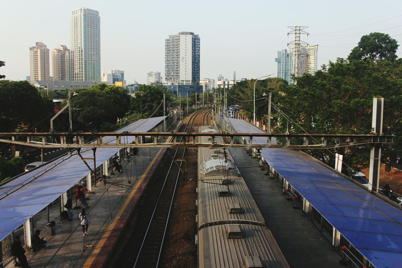 High angle view of trains on railroad tracks in city