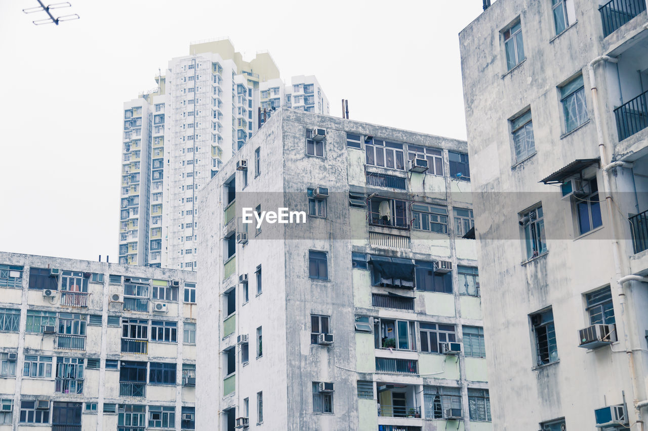 Low angle view of buildings against clear sky