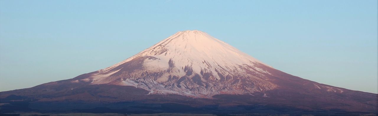 Low angle view of mountain against clear sky