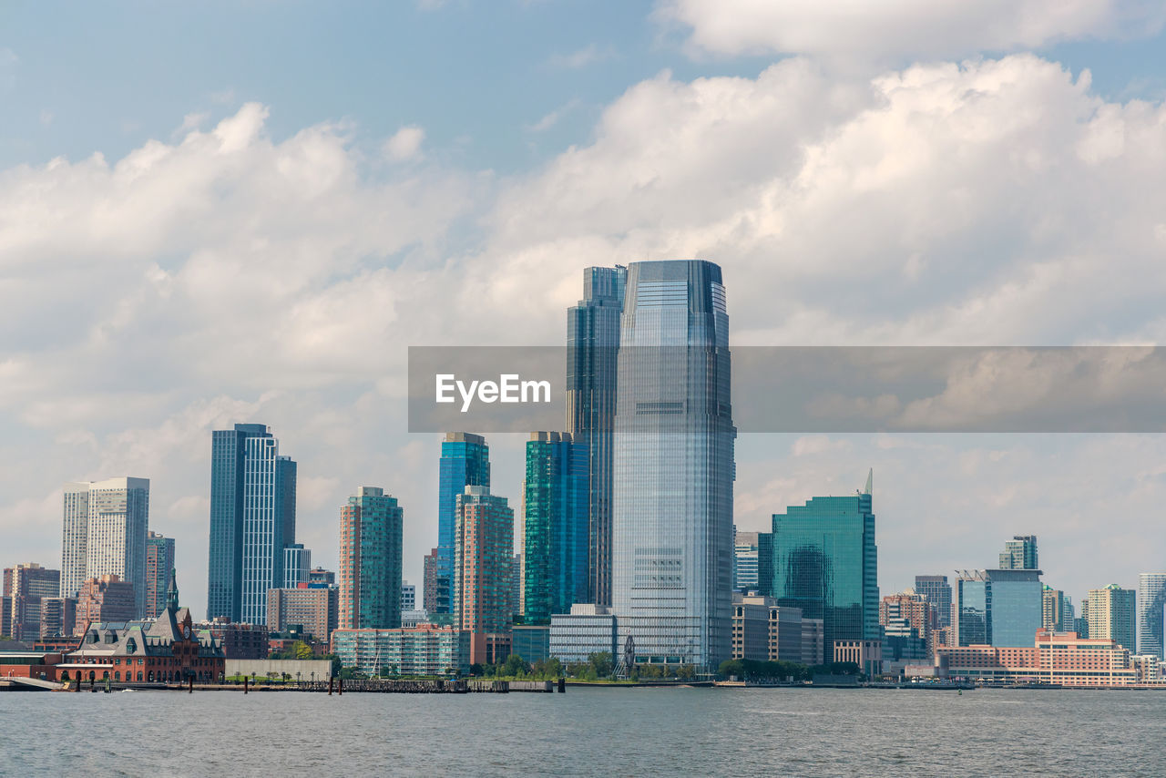 skyscrapers in city against sky