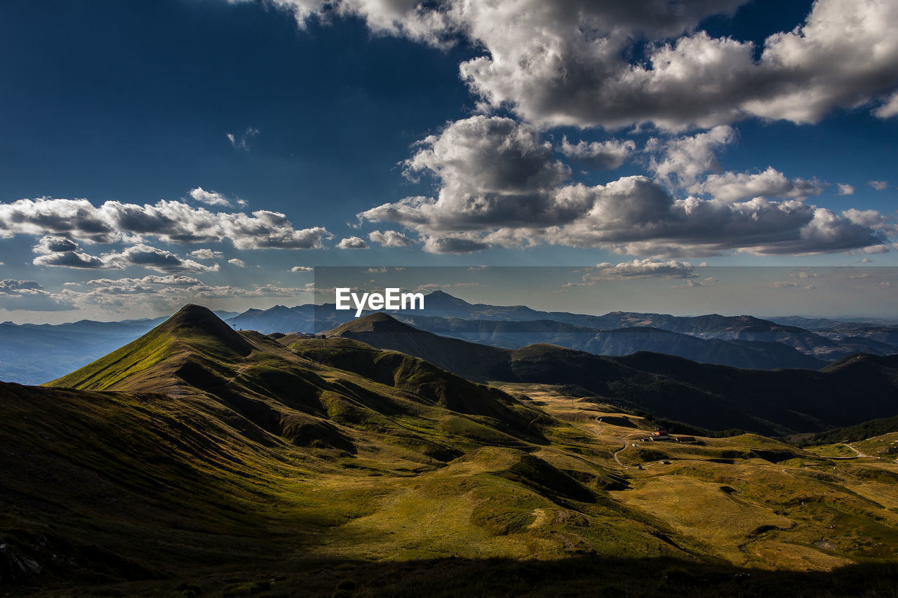 View of landscape against cloudy sky