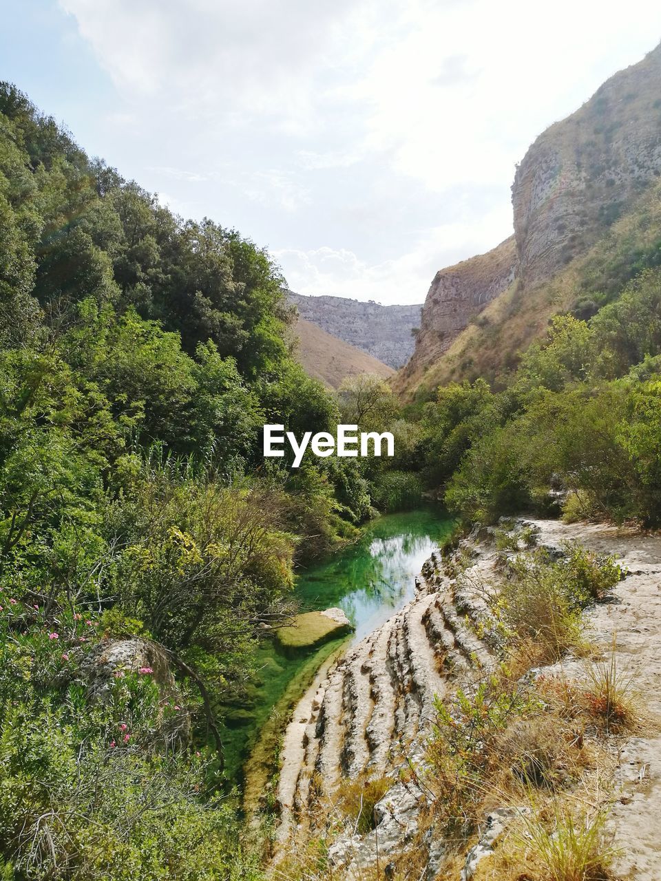 Scenic view of riserva naturale orientata cavagrande del cassibile against sky