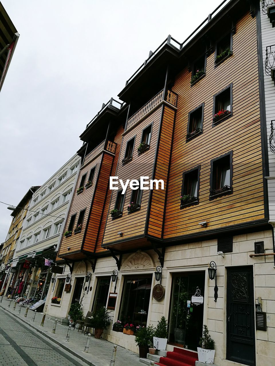 LOW ANGLE VIEW OF RESIDENTIAL BUILDING