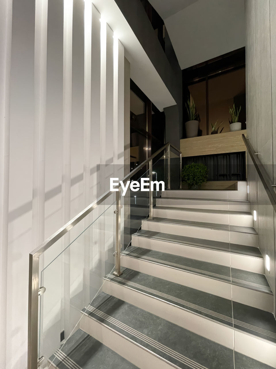 architecture, staircase, stairs, steps and staircases, built structure, railing, indoors, building, daylighting, interior design, home interior, handrail, luxury, wealth, home, no people, floor, house, residential district, elegance, sparse, room