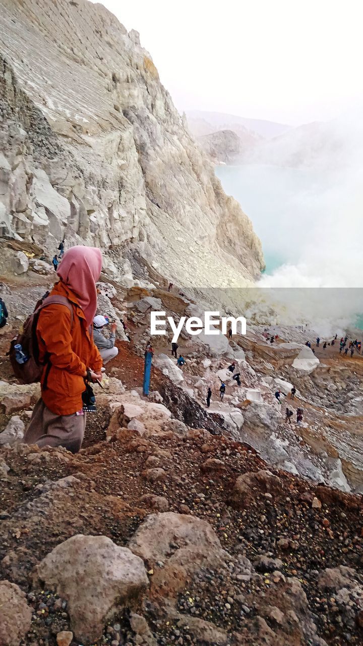 Woman hiker in ijen crater banyuwangi indonesia
