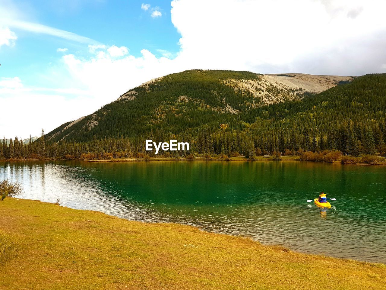 REFLECTION OF CLOUDS IN LAKE