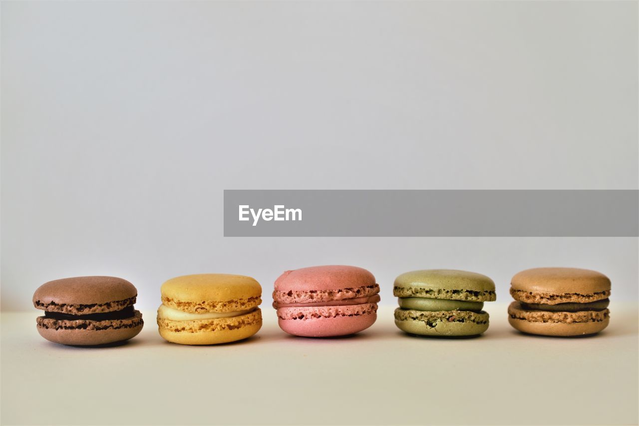 Close-up of candies against white background