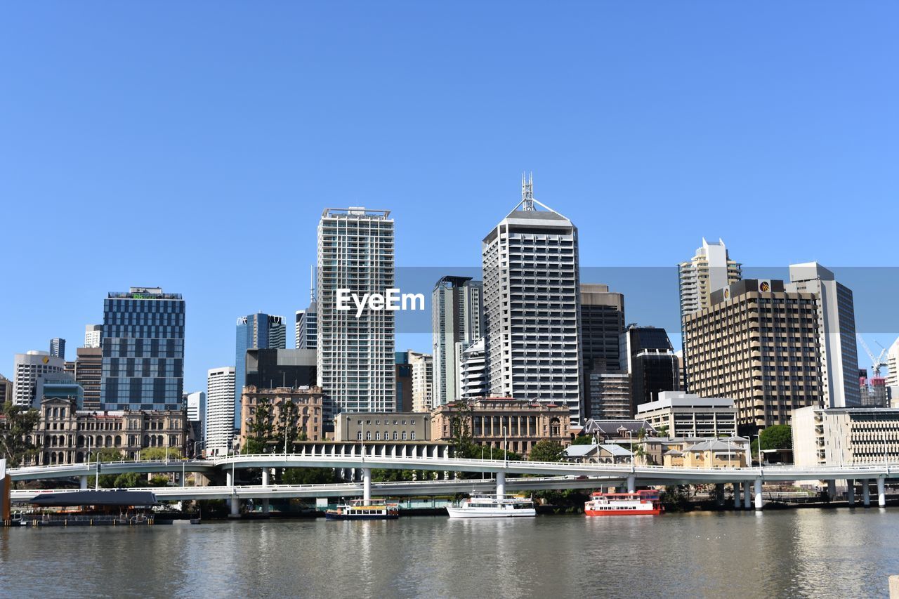 River by city against clear sky