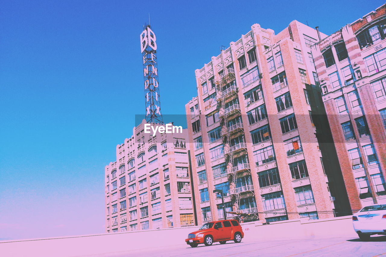 LOW ANGLE VIEW OF BUILDINGS