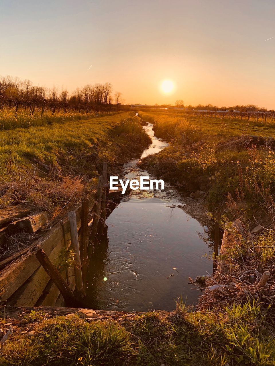 SCENIC VIEW OF SUNSET OVER LAND