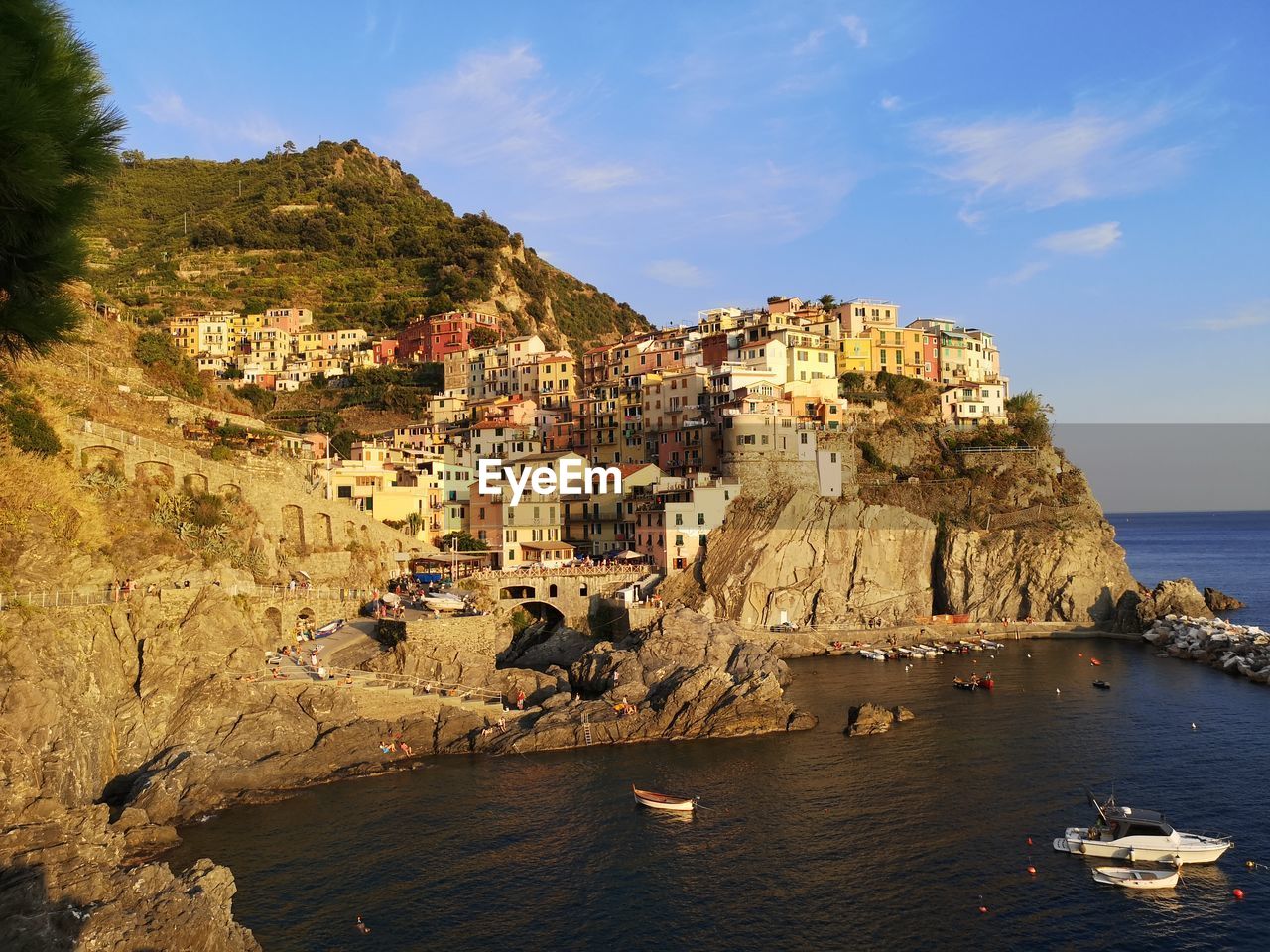 Panoramic view of sea and buildings against sky