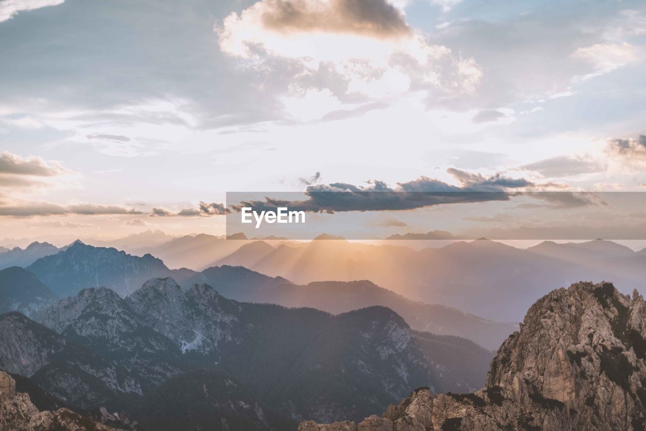 Scenic view of mountains against sky during sunset