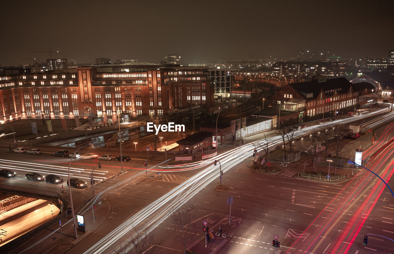 High angle view of illuminated cityscape at night