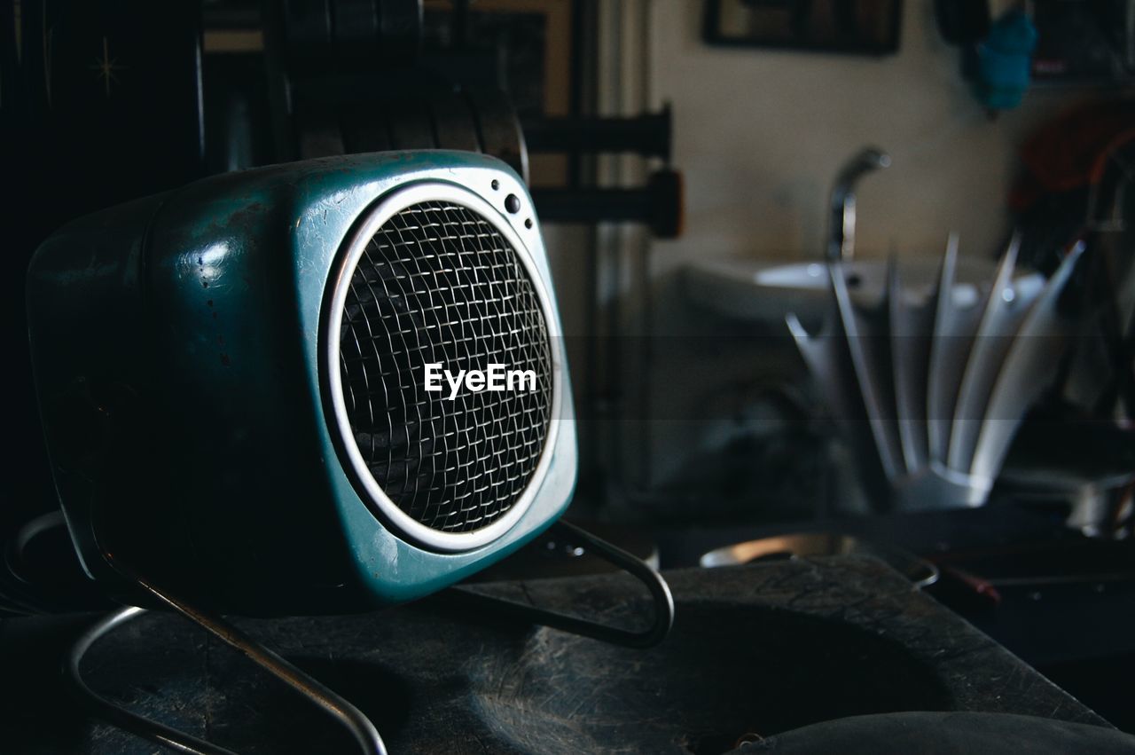 Close-up of speaker on table