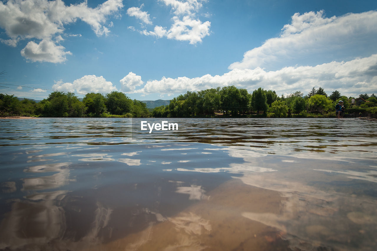 VIEW OF LAKE AGAINST SKY