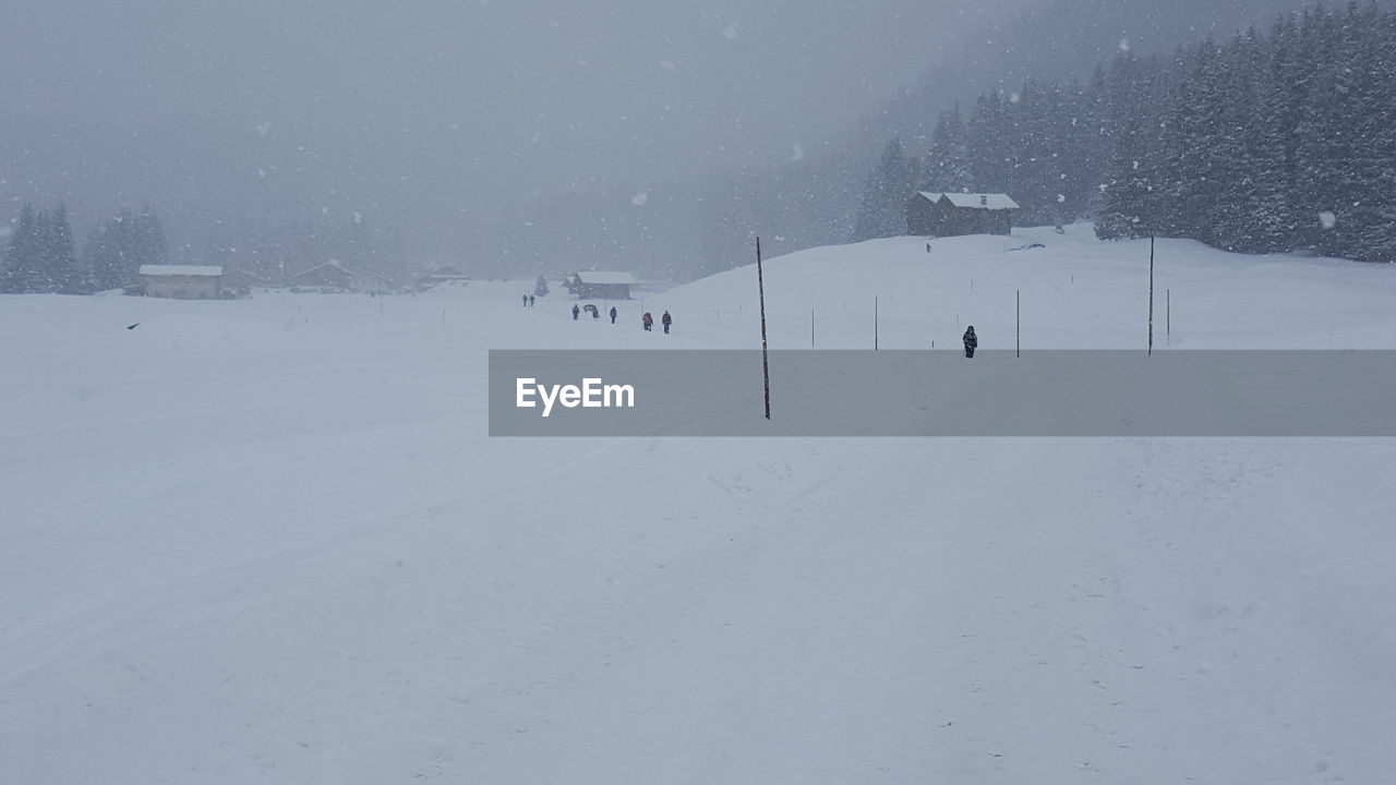 VIEW OF SNOW COVERED LANDSCAPE