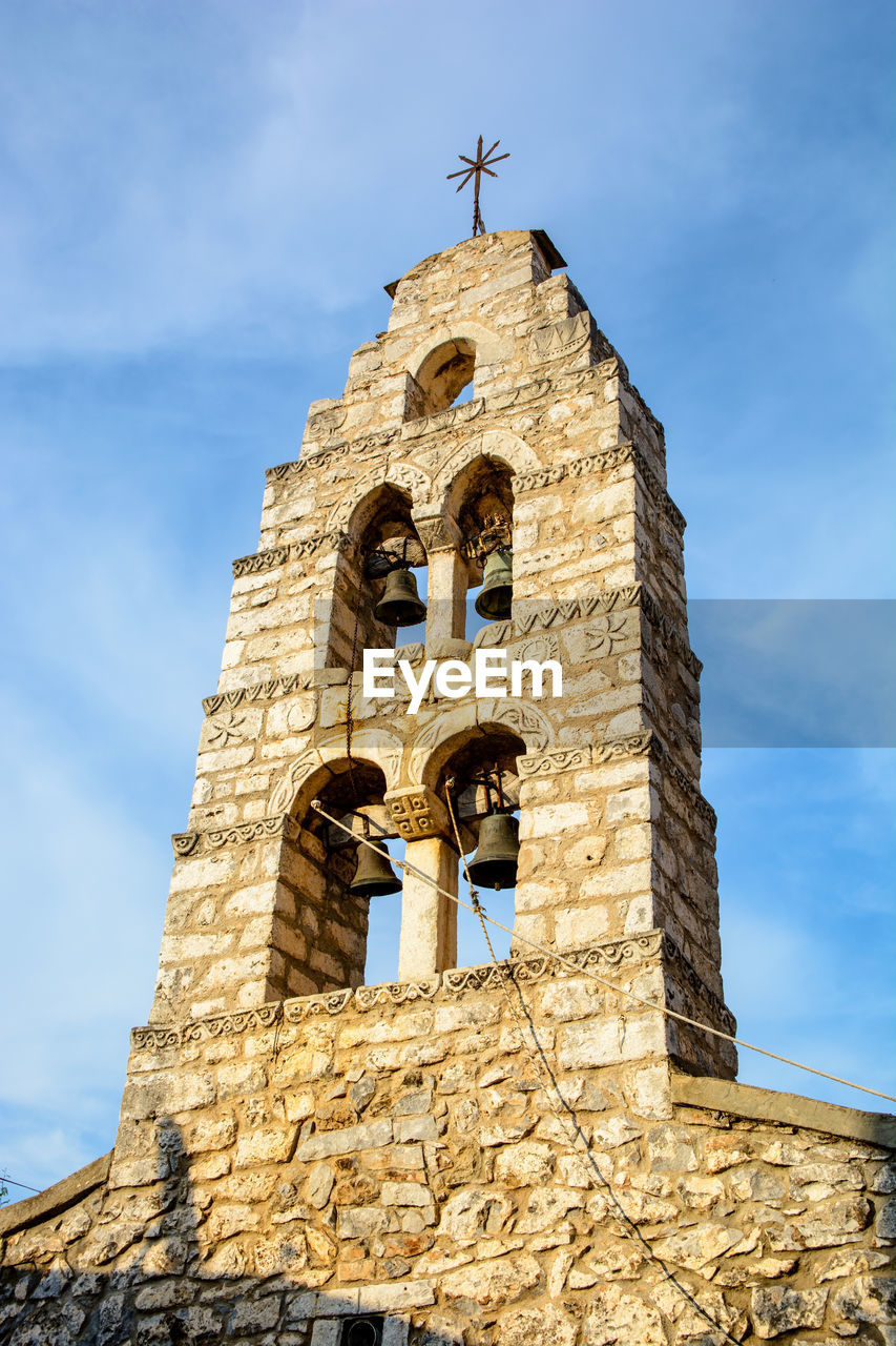 LOW ANGLE VIEW OF A BELL TOWER